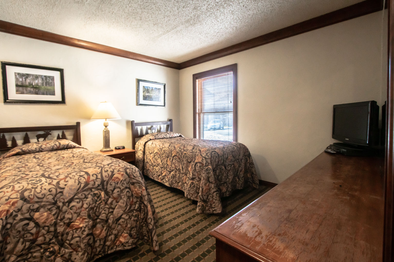 A room with double beds at VRI's Sunburst Resort in Steamboat Springs, CO.